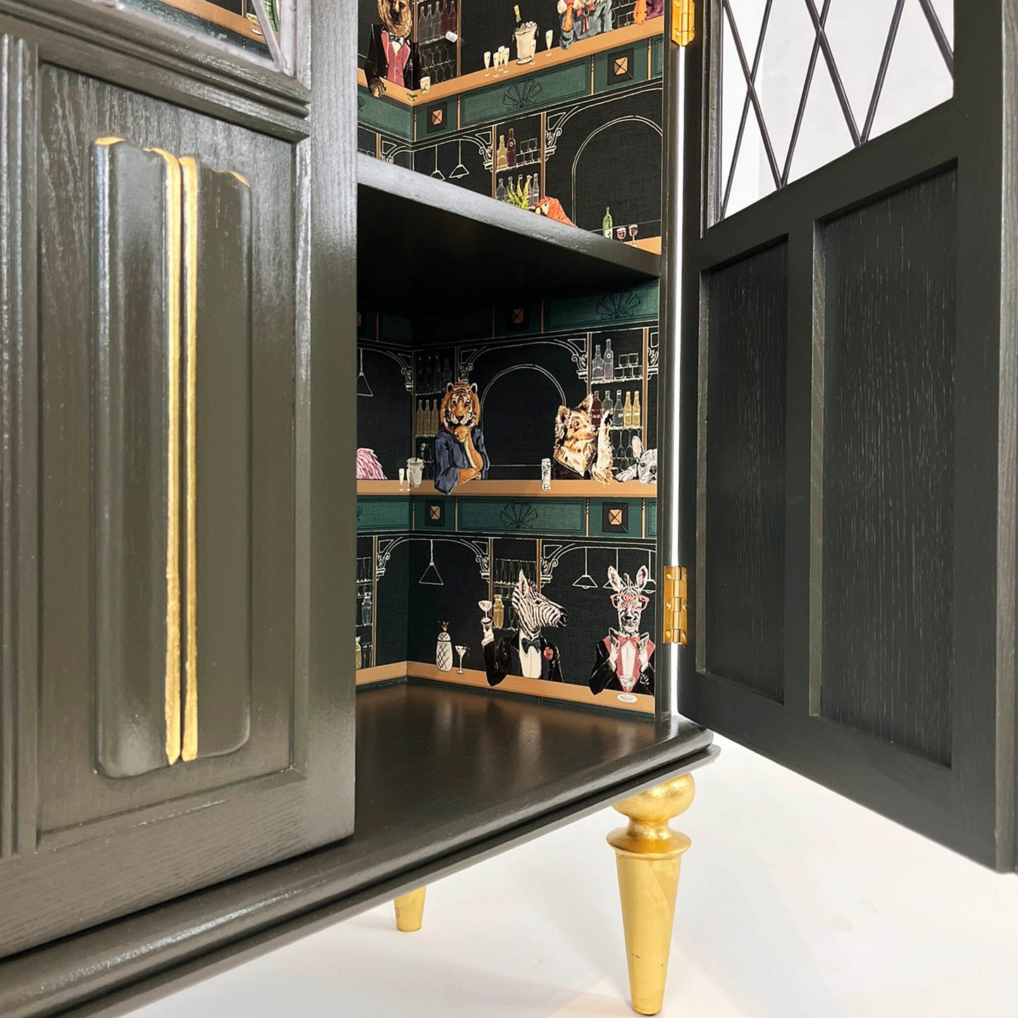 Bespoke vintage drinks cabinet with retro animals