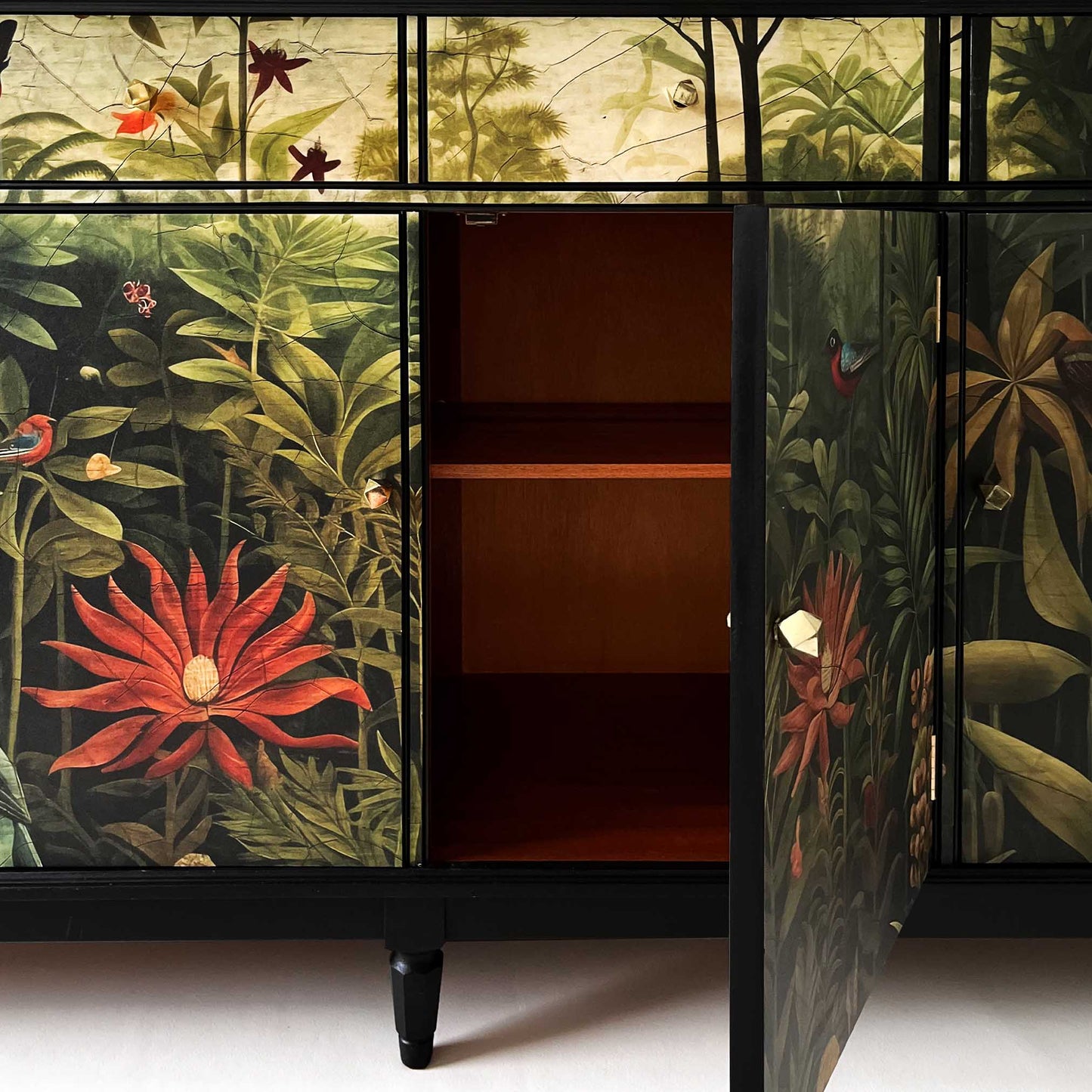 Antique black painted sideboard with opulent Jungle design