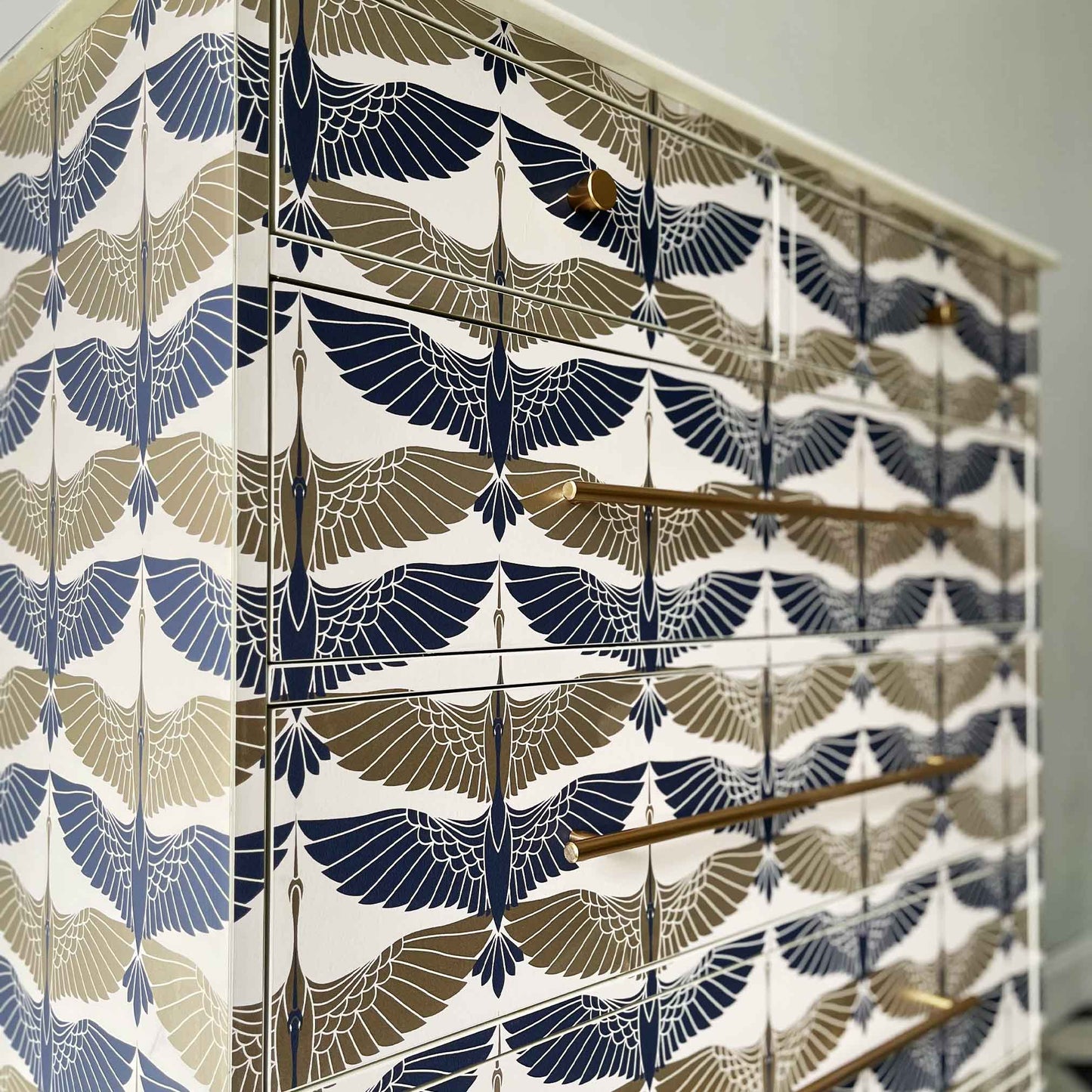 White upcycled chest of drawers with Oriental crane pattern